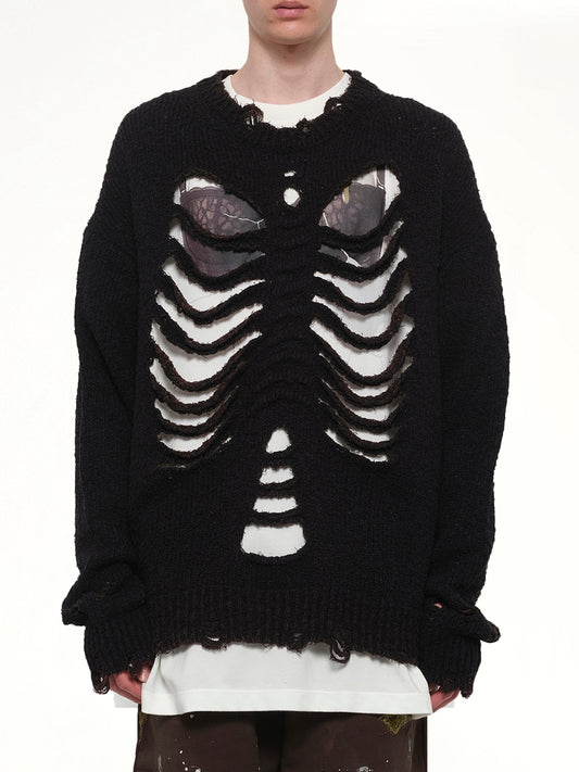 Image of a model wearing Outerwear. Product name - Rib & Spine Knit Pullover in Black colour by brand - DOUBLET
