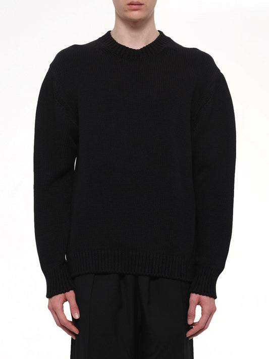 Image of a model wearing Outerwear. Product name - Crewneck in Black colour by brand - VOWELS