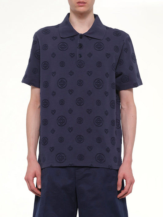 Image of a model wearing Tops. Product name - Applique Monogram Polo in Navy colour by brand - CASABLANCA