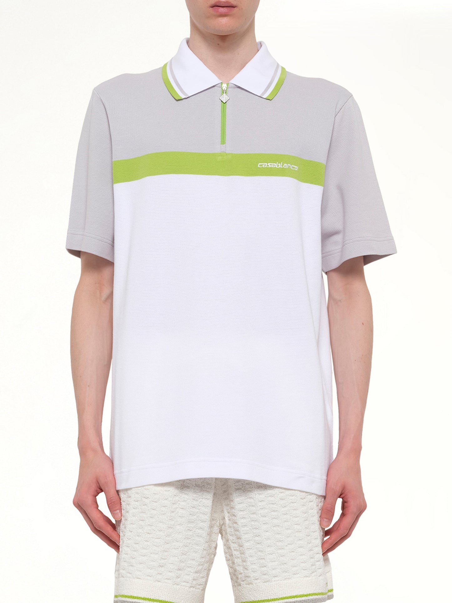 Image of a model wearing Tops. Product name - Quarter Zip Polo in Grey colour by brand - CASABLANCA