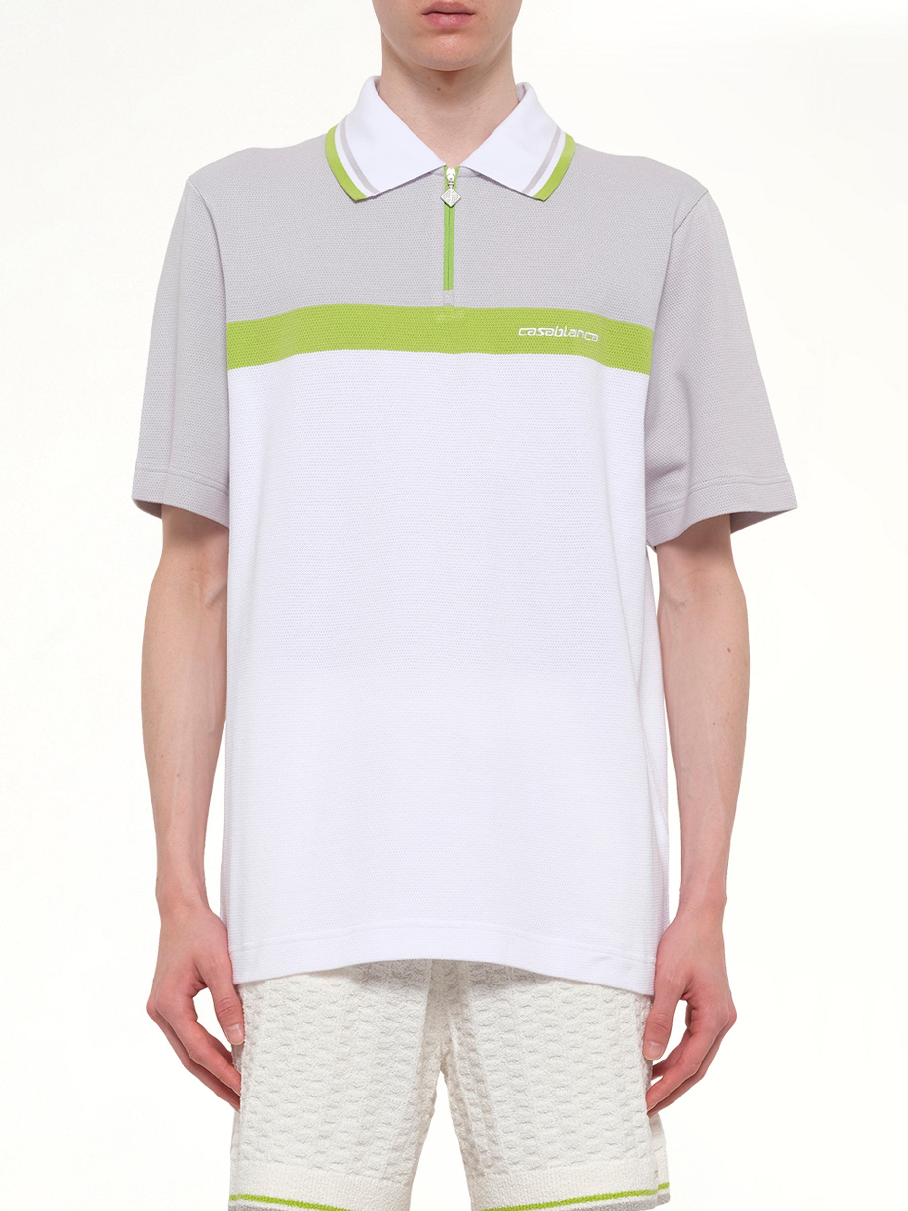 Image of a model wearing Tops. Product name - Quarter Zip Polo in Grey colour by brand - CASABLANCA