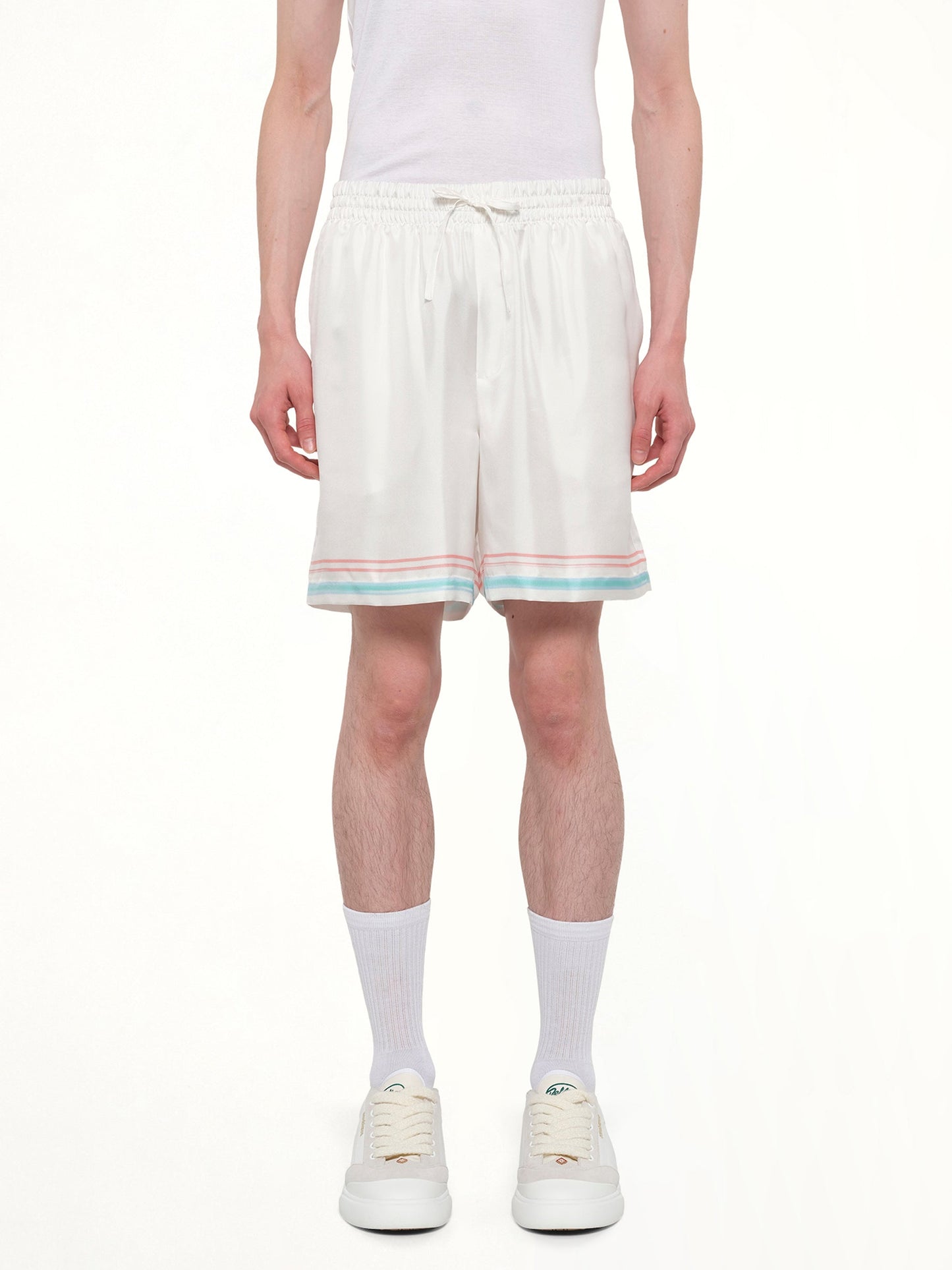 Image of a model wearing Shorts. Product name - Dance Joy Silk Shorts in White colour by brand - CASABLANCA