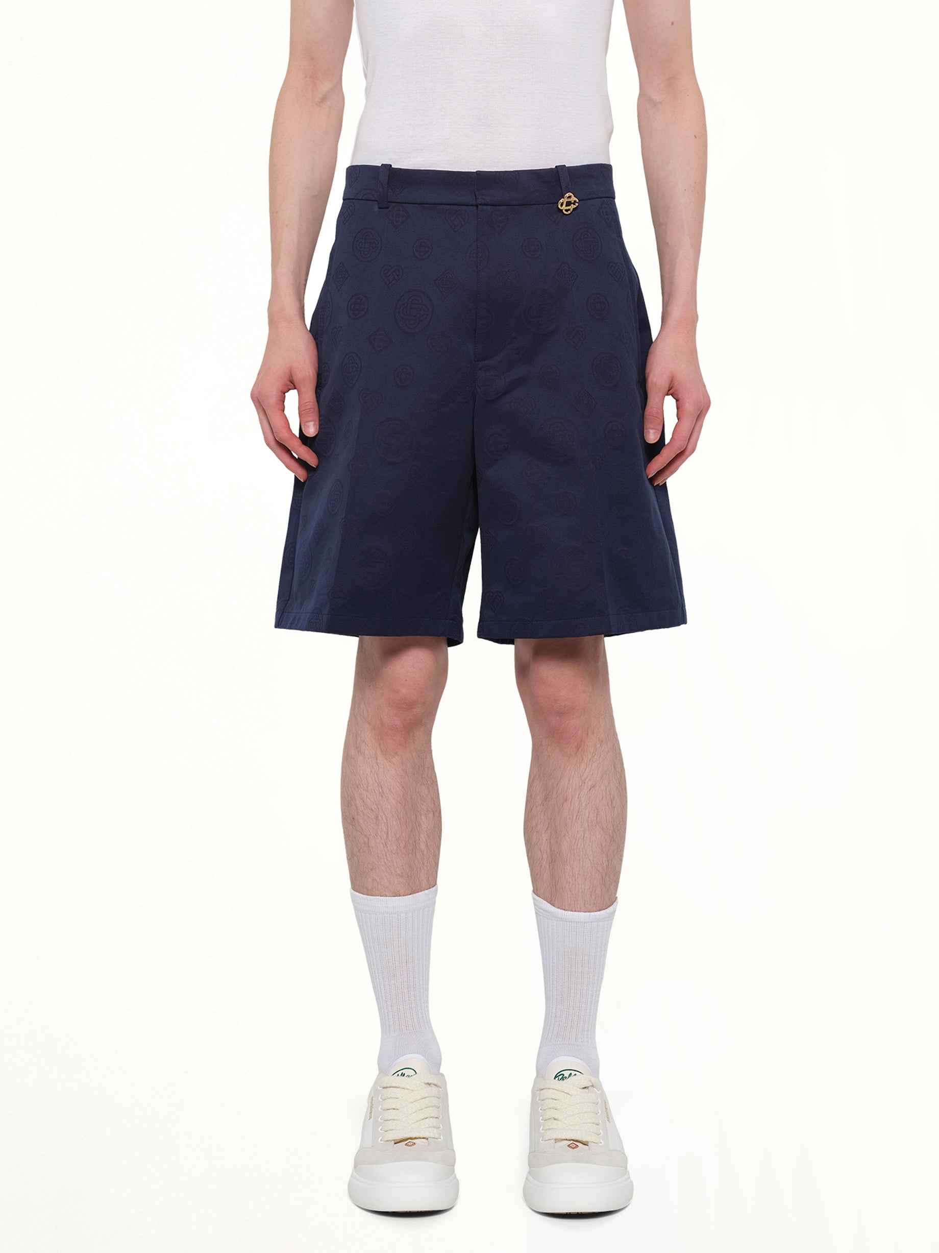 Image of a model wearing Shorts. Product name - Monogram Shorts in Navy colour by brand - CASABLANCA