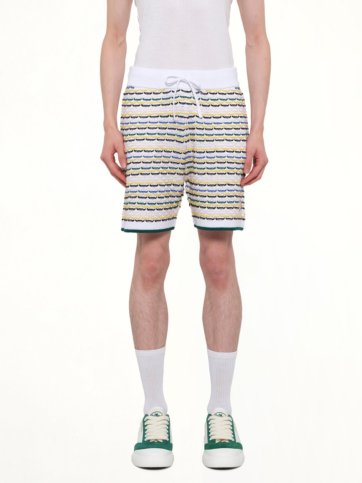 Image of a model wearing Shorts. Product name - Tuck Stitch Shorts in White colour by brand - CASABLANCA