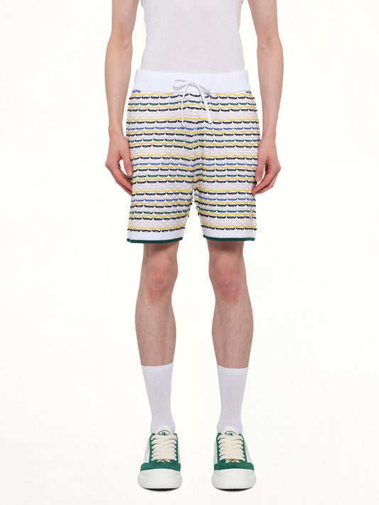 Image of a model wearing Shorts. Product name - Tuck Stitch Shorts in White colour by brand - CASABLANCA