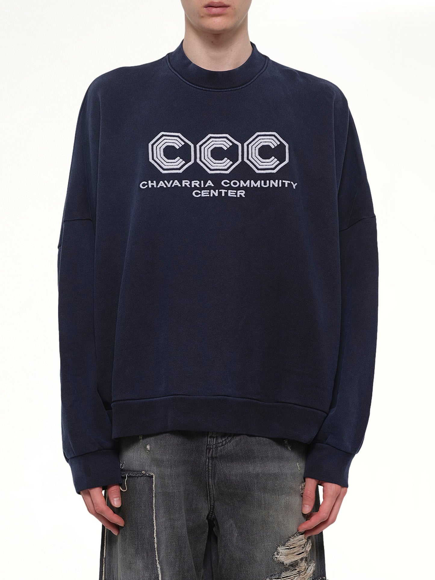 Image of a model wearing Outerwear. Product name - "CCC" Hooligan Sweatshirt in Blue colour by brand - WILLY CHAVARRIA