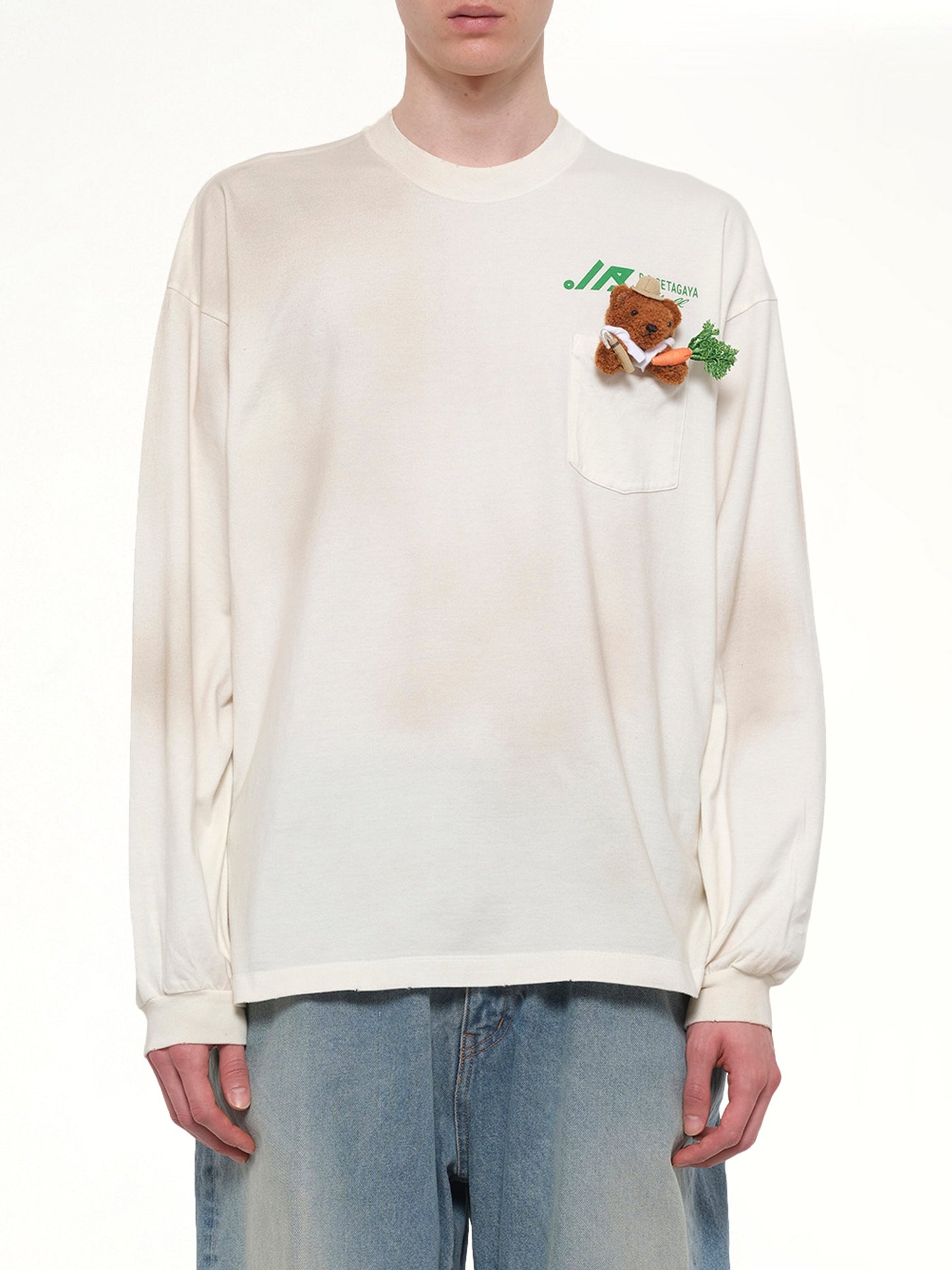 Image of a model wearing Tops. Product name - L/S T-Shirt With My Workwear Bear in White colour by brand - DOUBLET