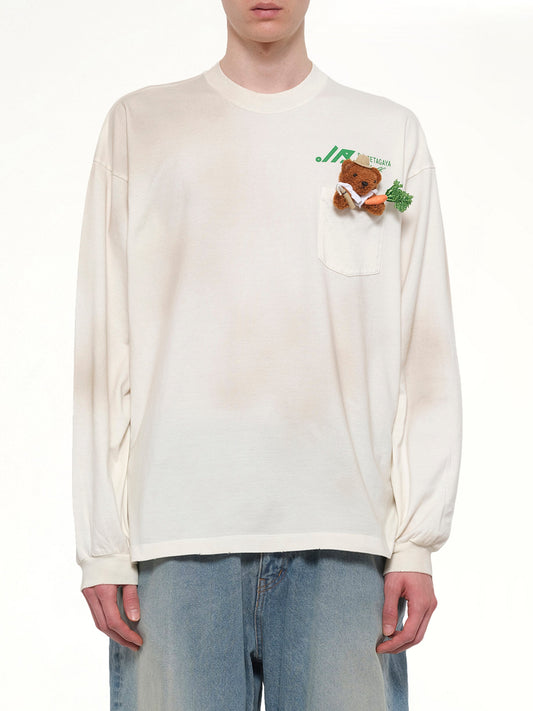Image of a model wearing Tops. Product name - L/S T-Shirt With My Workwear Bear in White colour by brand - DOUBLET