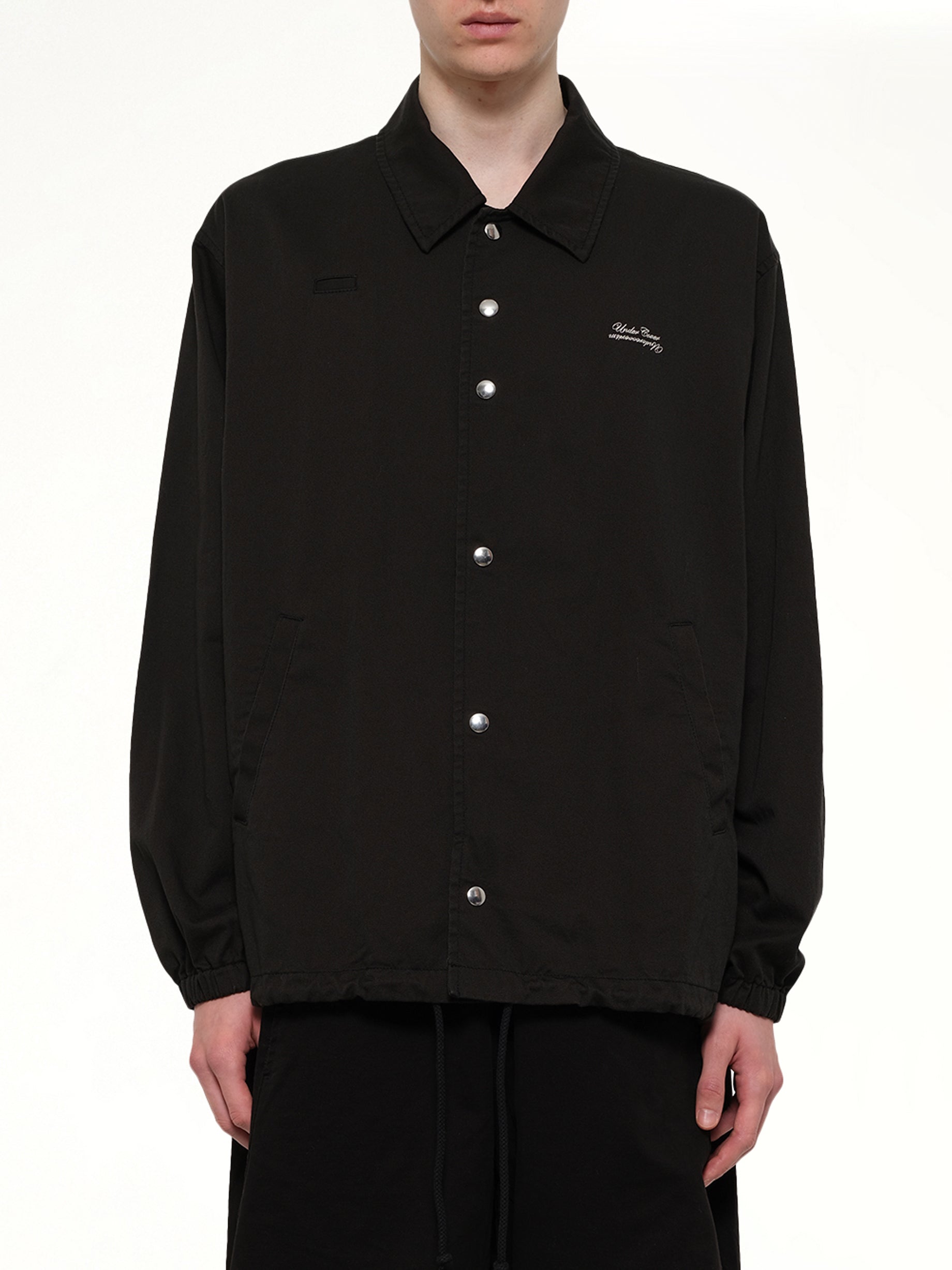 Image of Coats & Jackets. Product name - Cotton Coach Jacket in Black colour by brand - UNDERCOVER