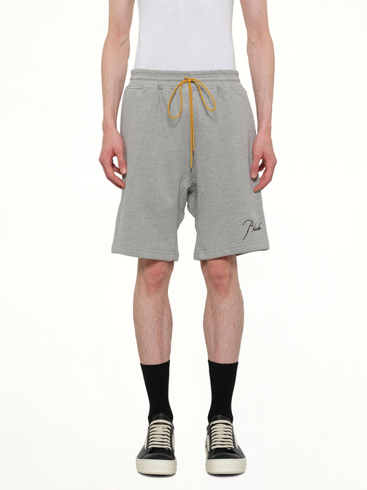 Image of a model wearing Shorts. Product name - Classique Sweatshort in Grey colour by brand - RHUDE