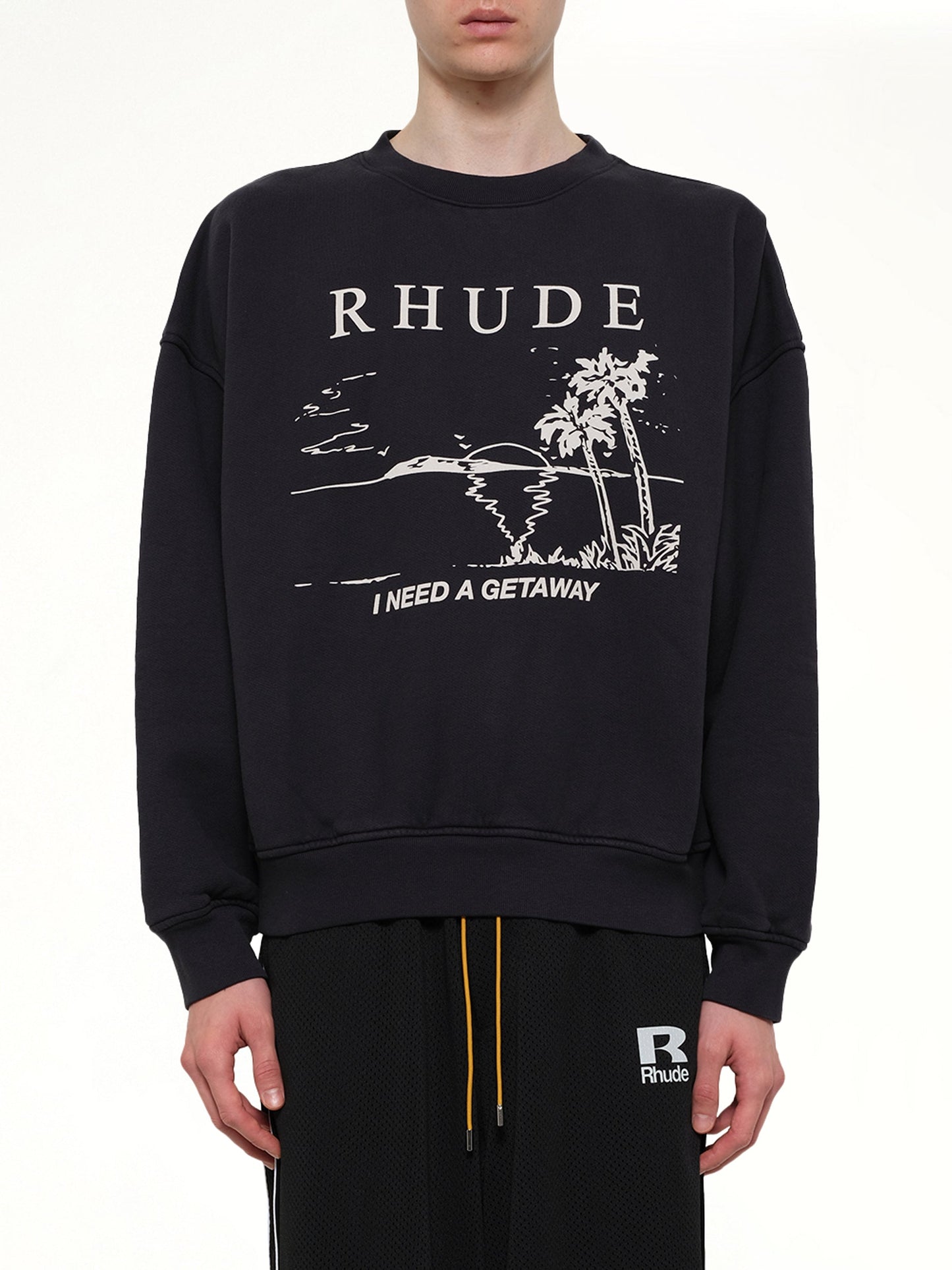 Image of a model wearing Outerwear. Product name - I Need A Getaway Sweatshirt in Black colour by brand - RHUDE