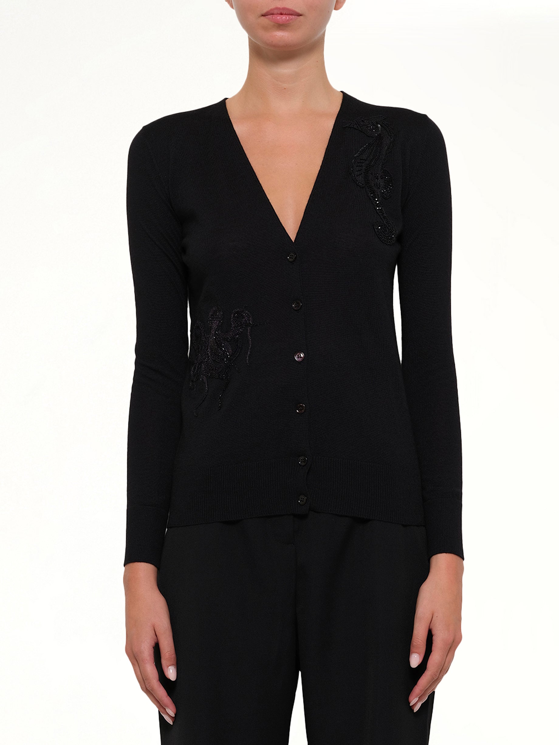 Image of a model wearing Outerwear. Productname: V Neck Cardigan in Black colour by brand - ALEXANDER MCQUEEN