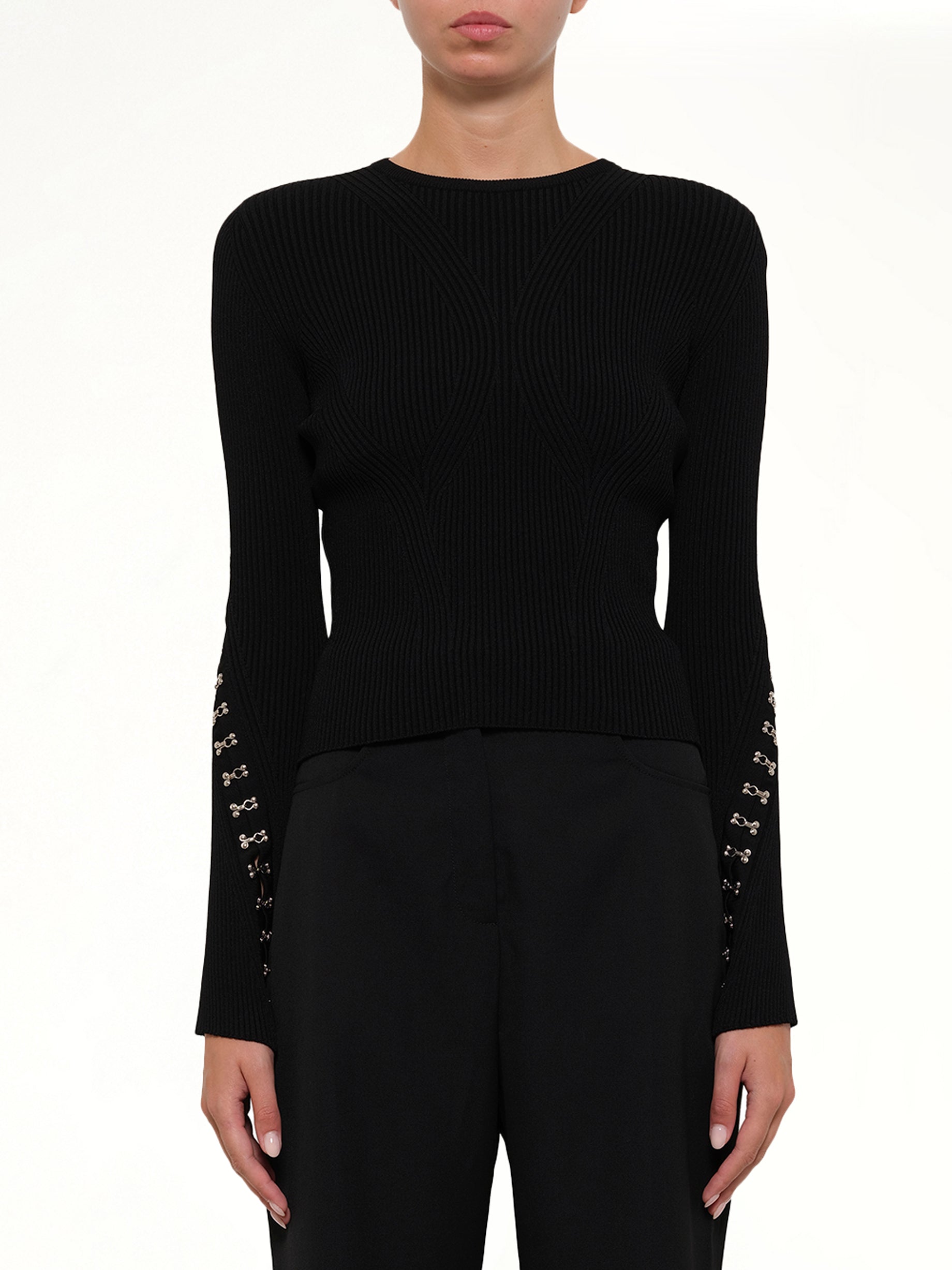 Image of a model wearing Outerwear. Productname: Slash Crew Neck Knitwear in Black colour by brand - ALEXANDER MCQUEEN