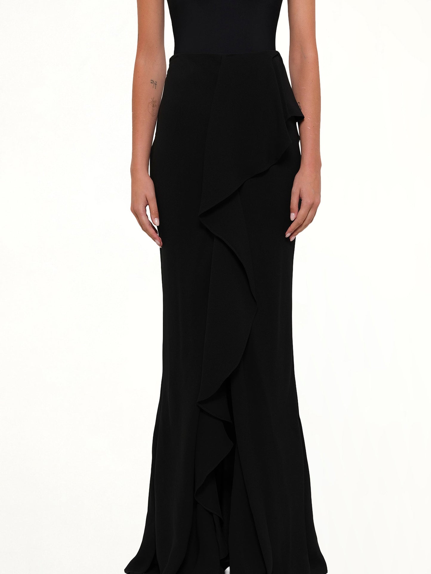 Image of a model wearing Skirts. Productname: Amq Long Drape Skirt in Black colour by brand - ALEXANDER MCQUEEN