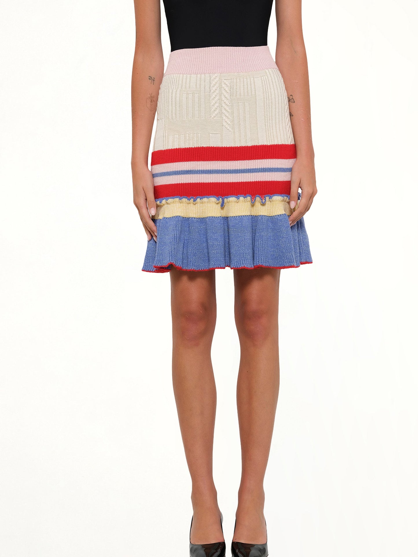 Image of a model wearing Skirts. Productname: Amq Multi Knit Tweed Mini Skirt In 8517 in 8517 colour by brand - ALEXANDER MCQUEEN