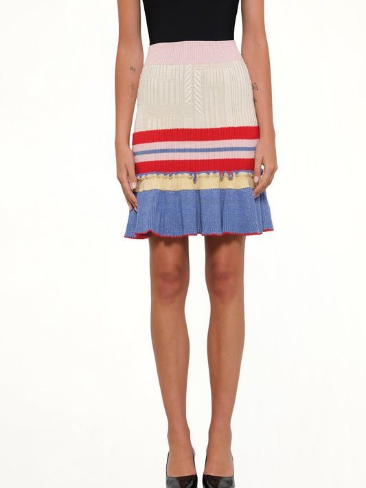 Image of a model wearing Skirts. Productname: Amq Multi Knit Tweed Mini Skirt In 8517 in 8517 colour by brand - ALEXANDER MCQUEEN