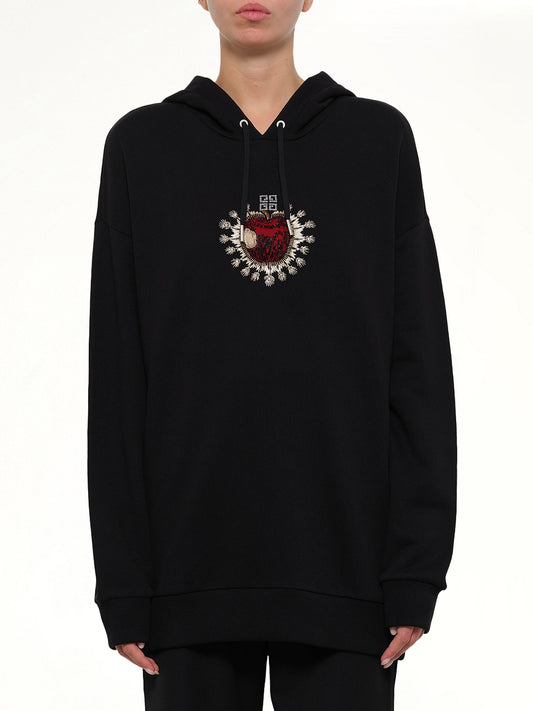 Image of a model wearing Outerwear. Productname: Sacred Apple Hoodie in Black colour by brand - GIVENCHY