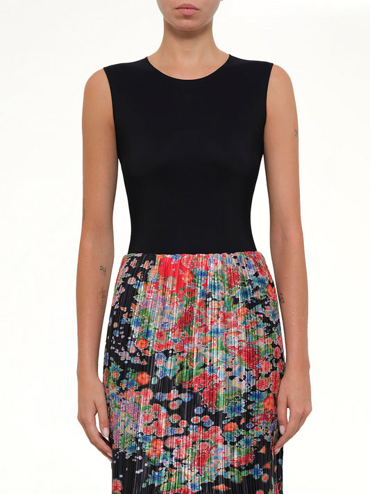 Image of a model wearing Skirts. Productname: Asym Bloom Pleated Skirt in Red colour by brand - GIVENCHY