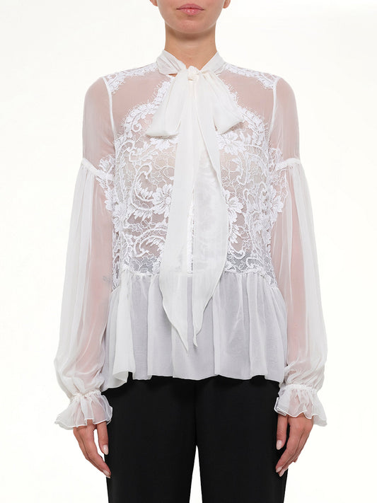 Image of a model wearing Tops. Productname: Givenchy Long Sleeve Tops in White colour by brand - GIVENCHY