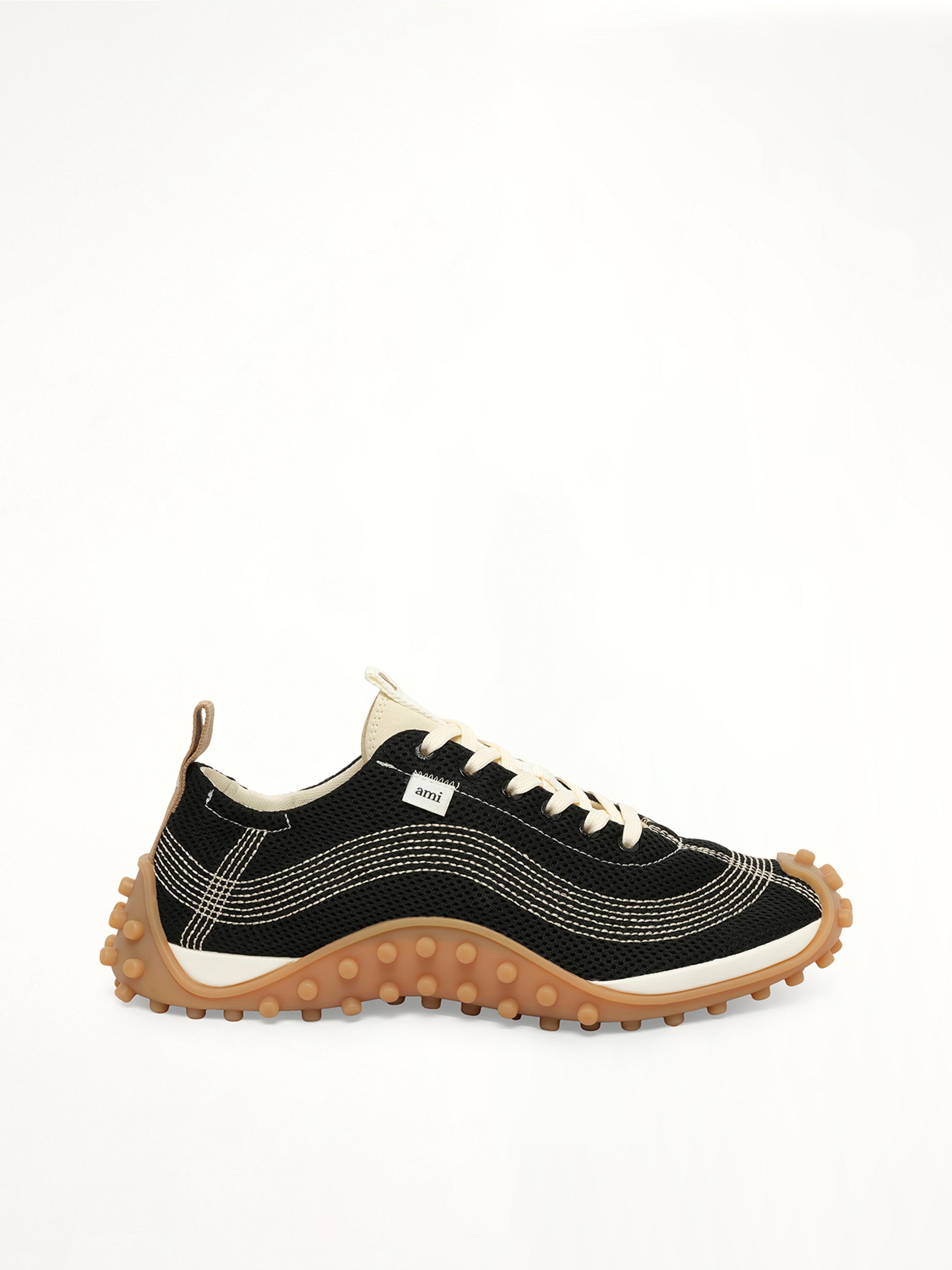 Image of Sneakers. Product name - Mirage Sneakers in Black colour by brand - AMI PARIS