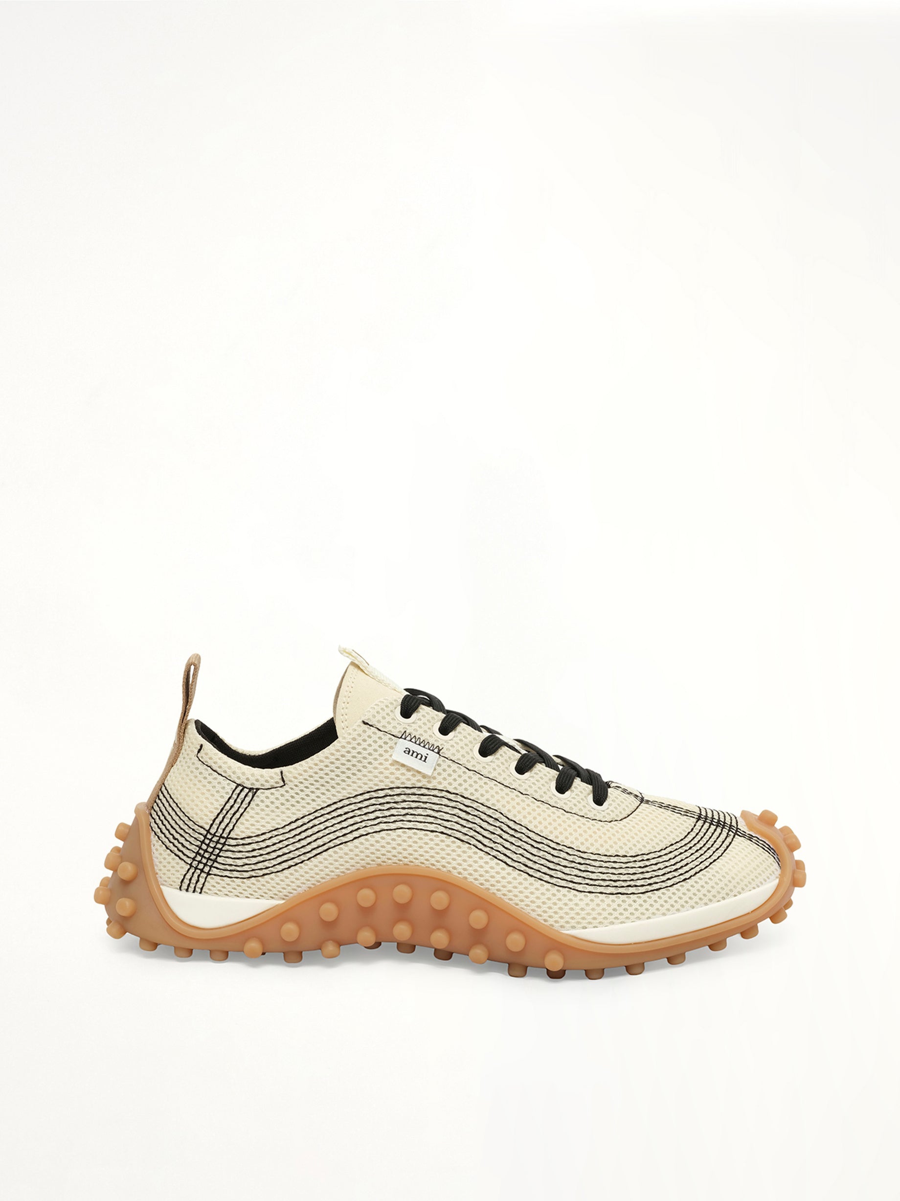 Image of Sneakers. Product name - Mirage Sneakers in White colour by brand - AMI PARIS
