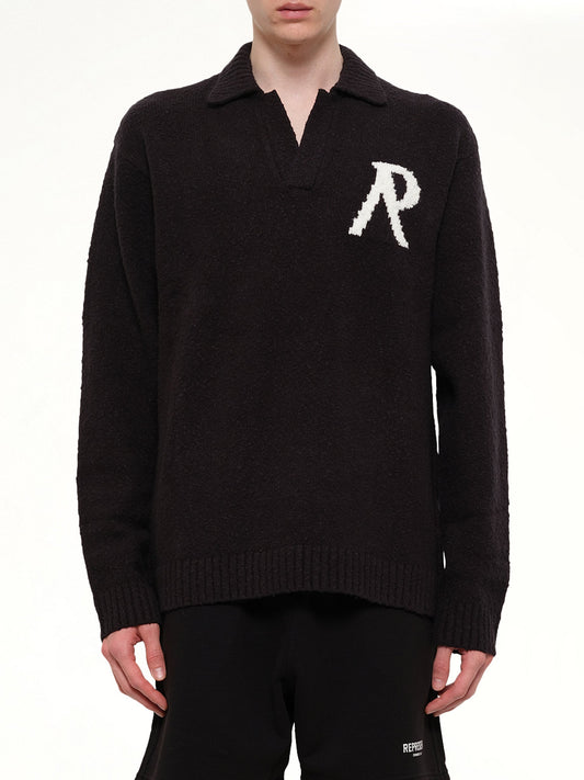 Image of a model wearing Tops. Product name - Knitted Boucle Polo in Black colour by brand - REPRESENT