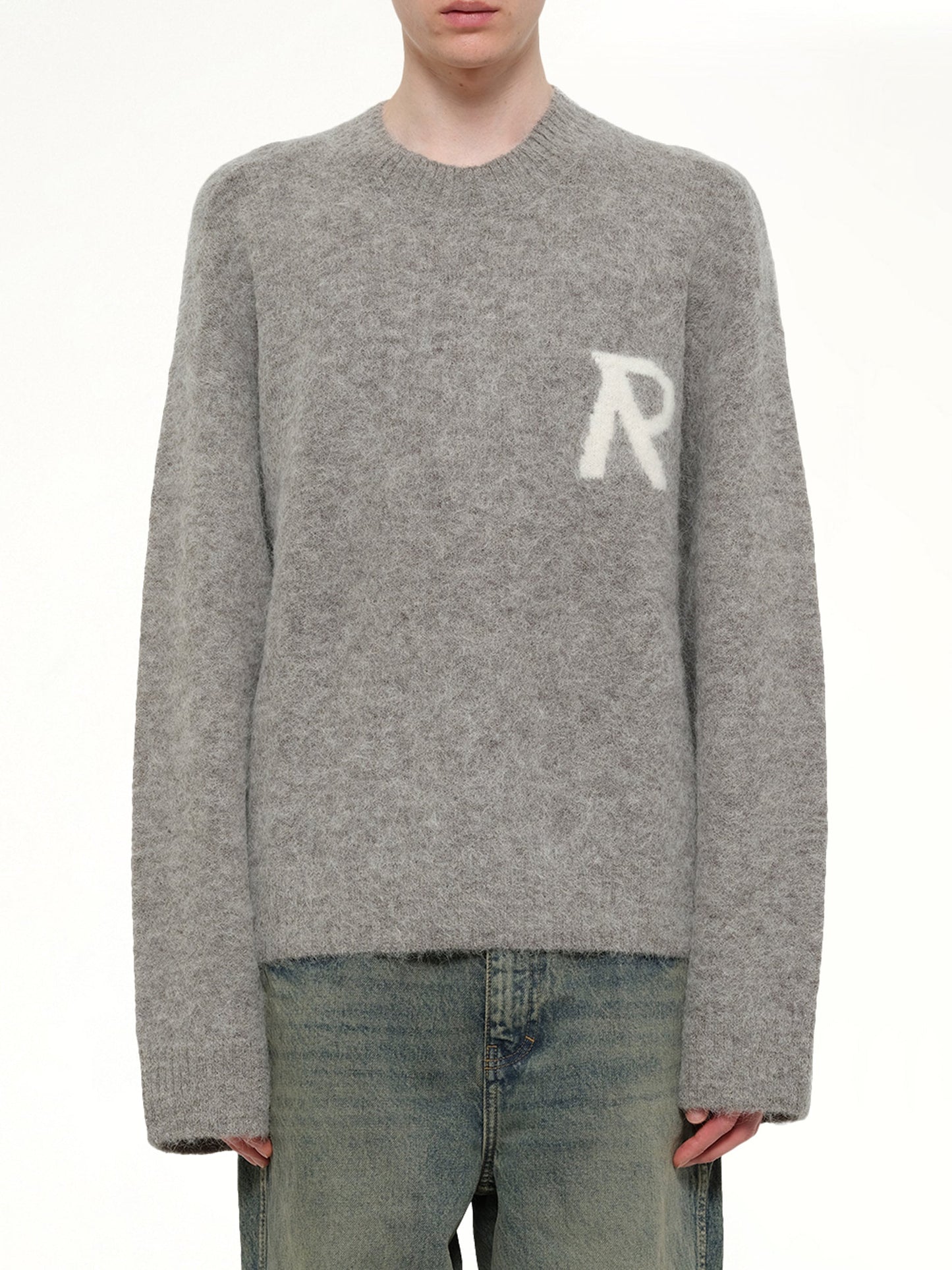 Image of a model wearing Outerwear. Product name - Logo Knit Sweater in Grey colour by brand - REPRESENT