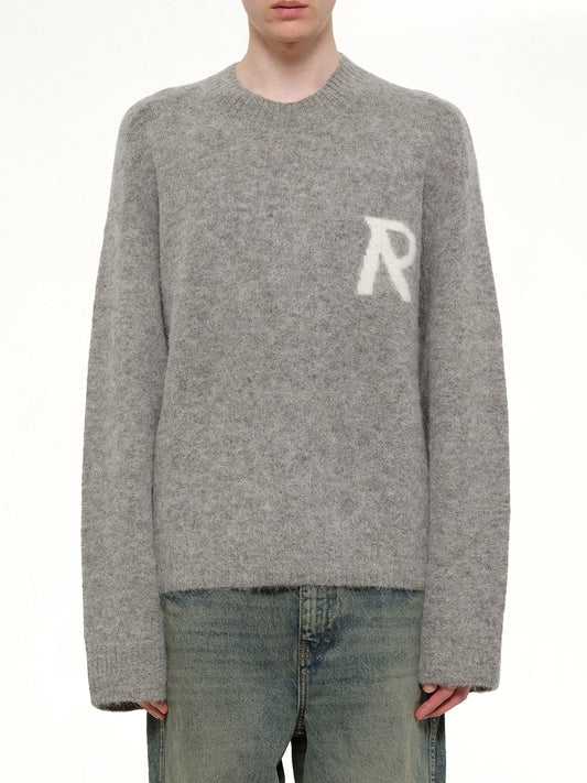 Image of a model wearing Outerwear. Product name - Logo Knit Sweater in Grey colour by brand - REPRESENT