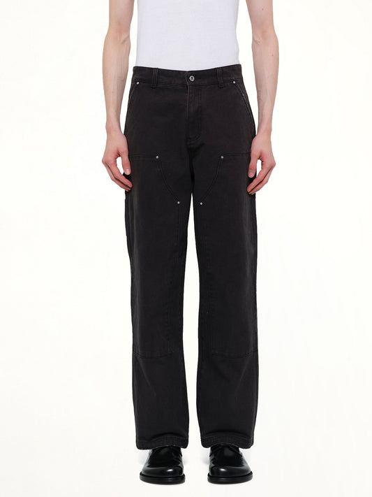 Image of a model wearing Pants. Product name - Worker Pant in Black colour by brand - REPRESENT