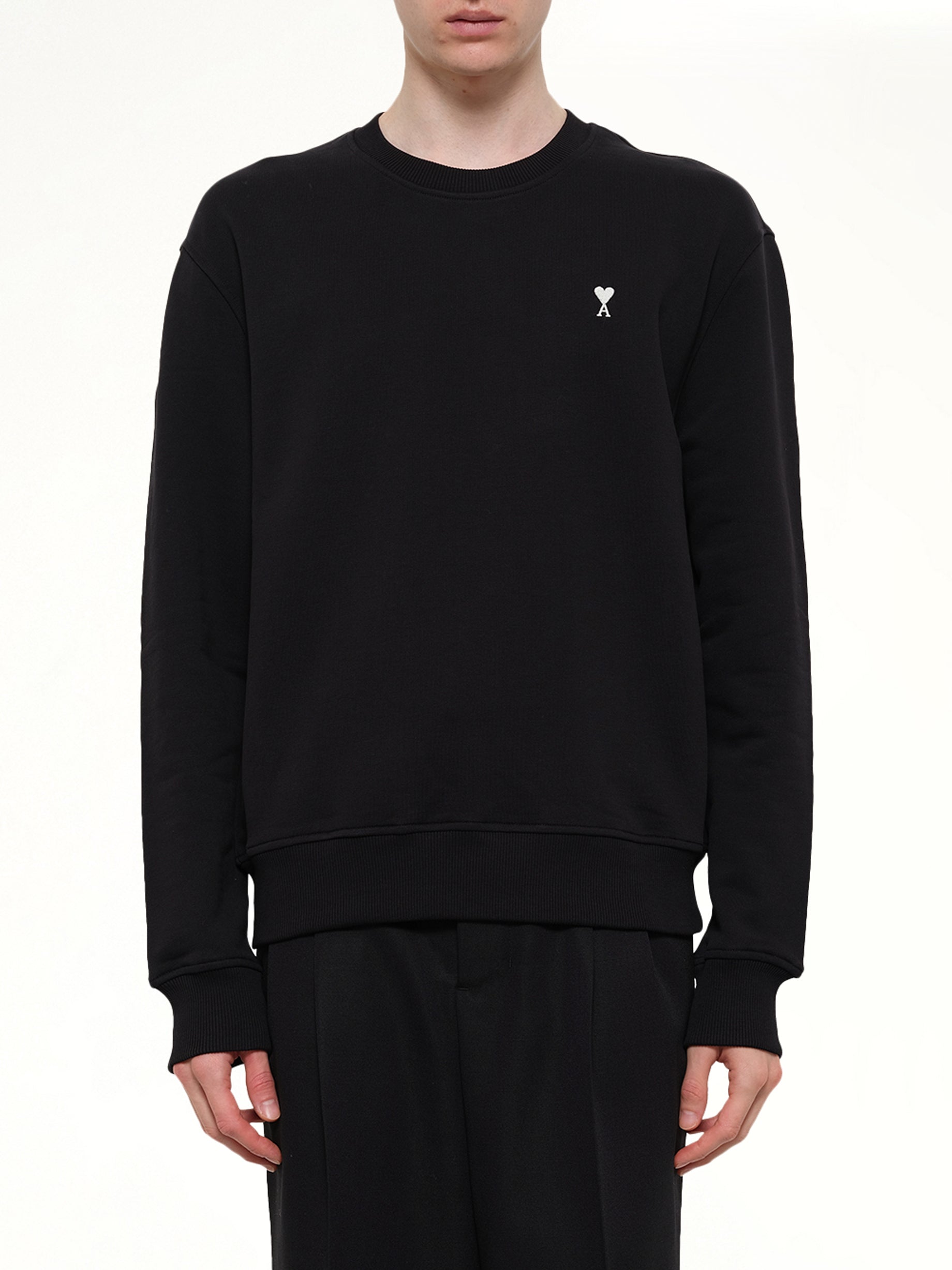 Image of a model wearing Outerwear. Product name - Contrasted ADC Sweatshirt in Black colour by brand - AMI PARIS