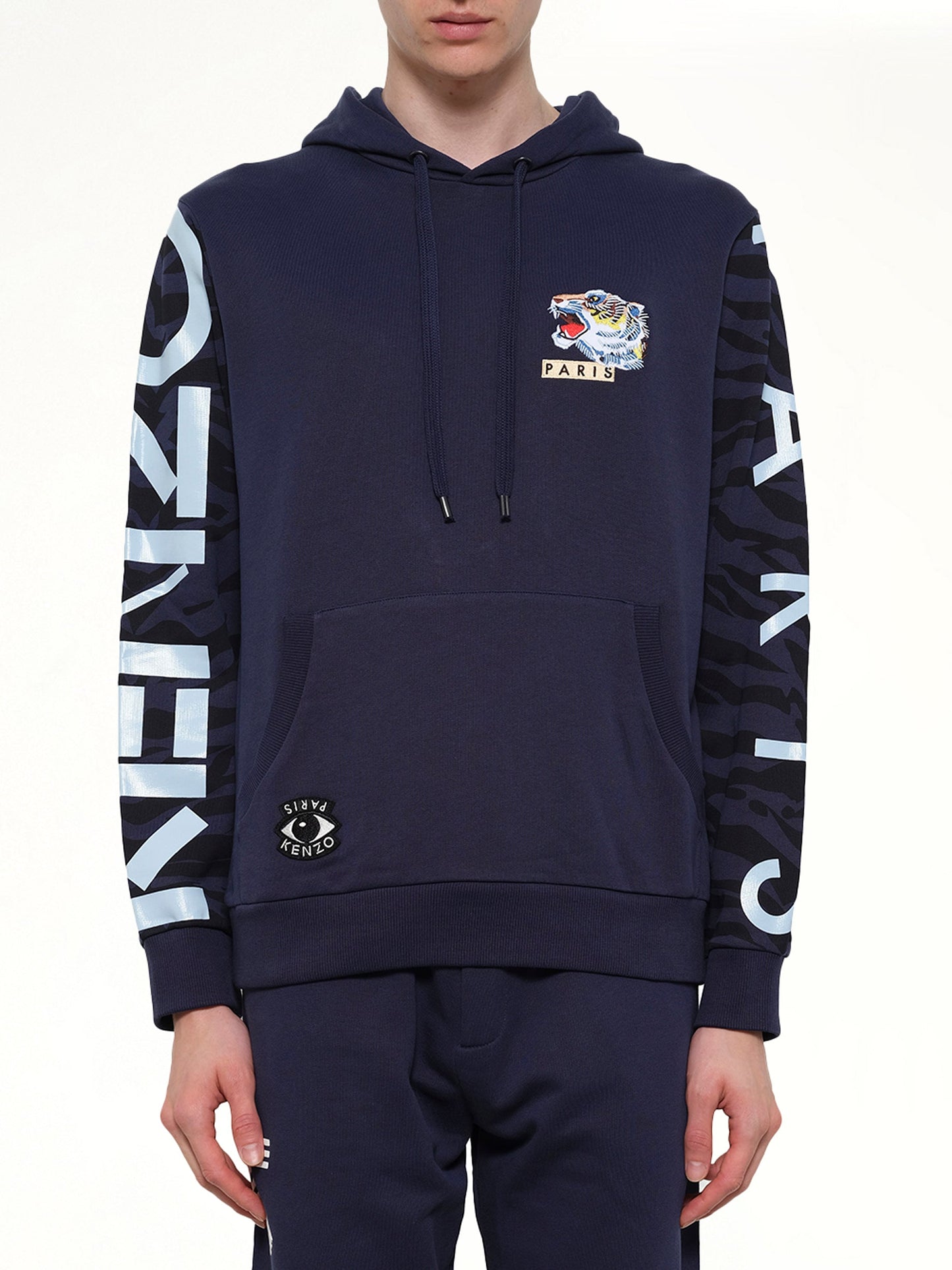Image of a model wearing Outerwear. Product name - Icons Hoodie in Ink colour by brand - KENZO