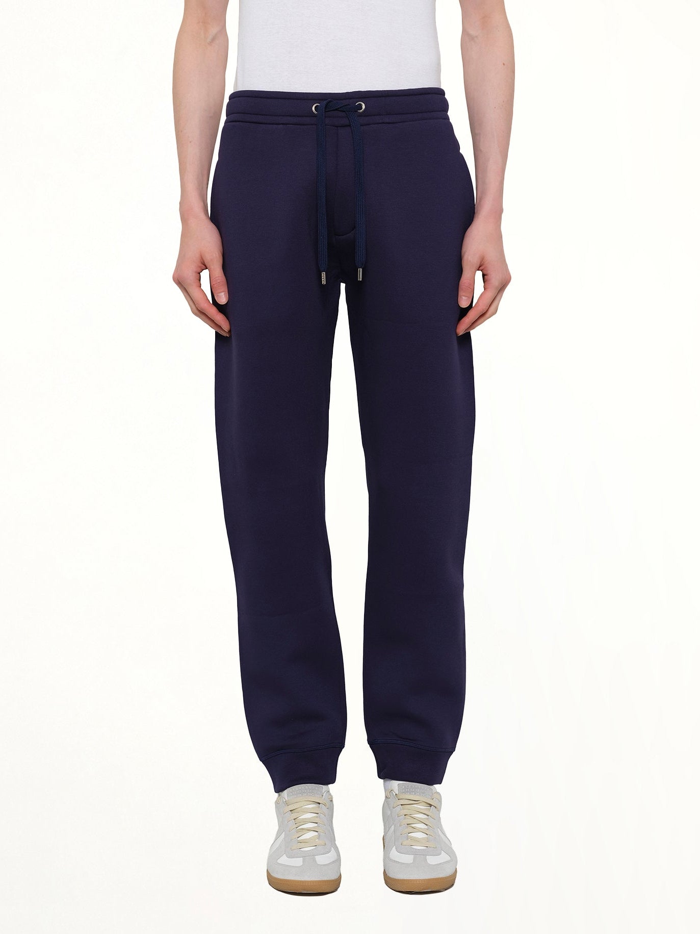 Image of a model wearing Pants. Product name - Kenzo Pants in Blue colour by brand - KENZO