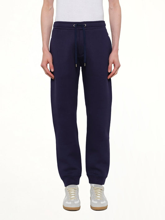 Image of a model wearing Pants. Product name - Kenzo Pants in Blue colour by brand - KENZO