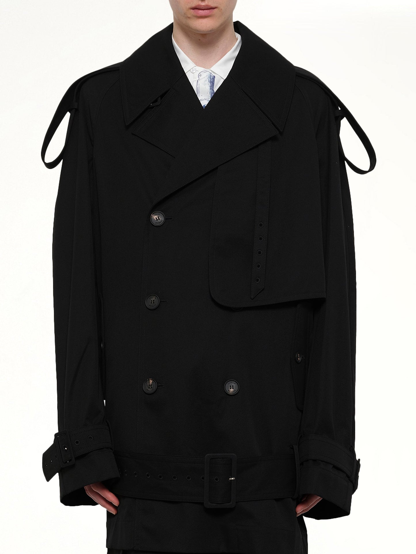 Image of a model wearing Outerwear. Product name - Unlined Technical Trench Coat in Black colour by brand - EGONLAB