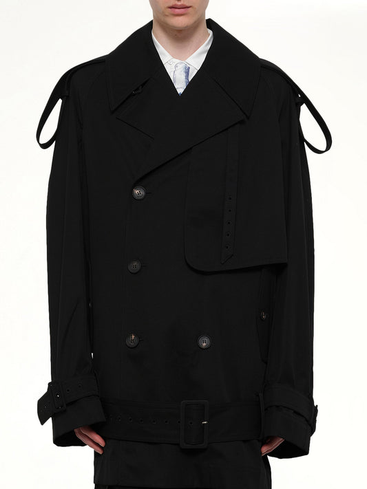 Image of a model wearing Outerwear. Product name - Unlined Technical Trench Coat in Black colour by brand - EGONLAB