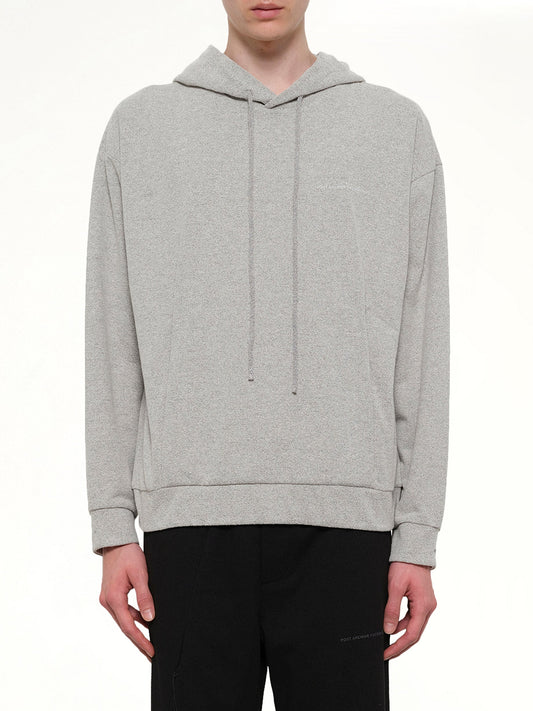 Image of a model wearing Outerwear. Product name - Work Hoodie (Archive) in Grey colour by brand - POST ARCHIVE FACTION