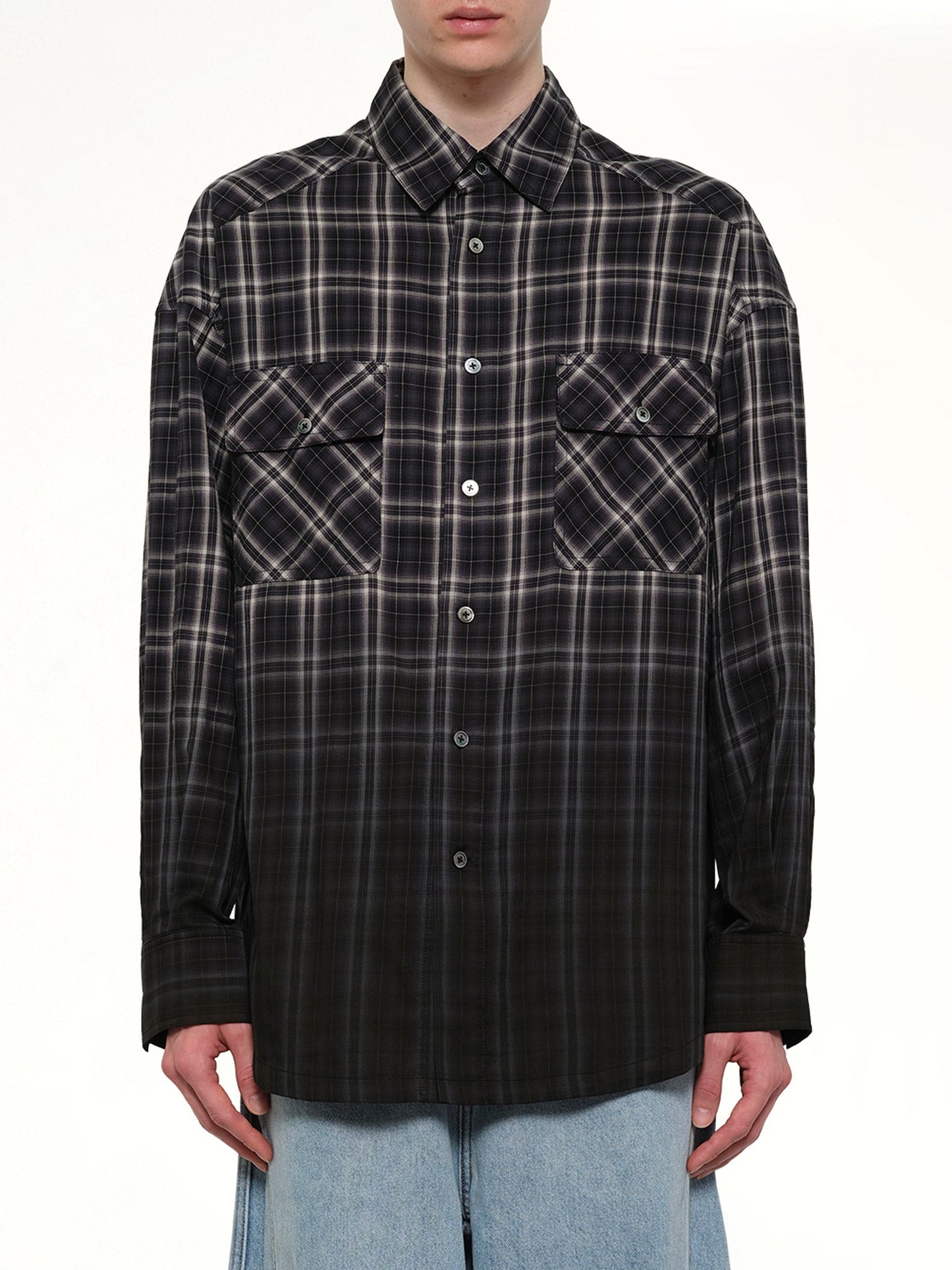 Image of a model wearing Tops. Product name - Check Workwear Shirt in Black colour by brand - FENG CHEN WANG