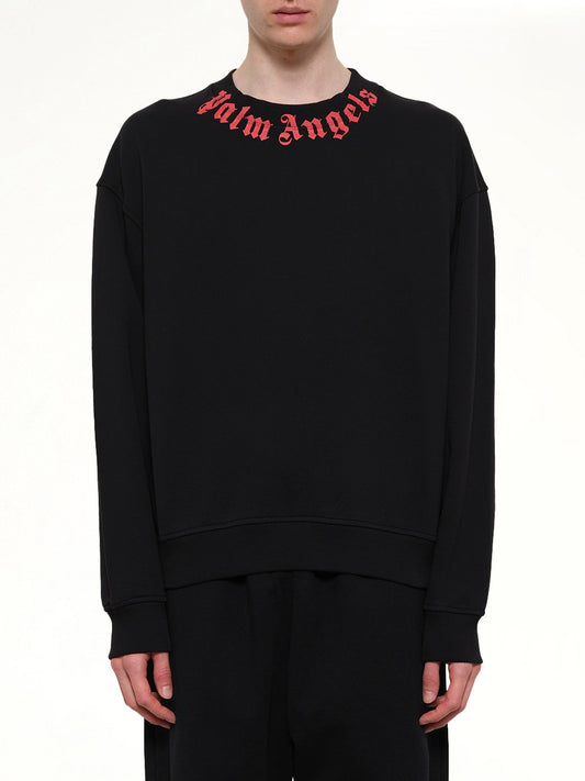 Image of a model wearing Outerwear. Product name - Neck Logo Regular Sweatshirt in Black colour by brand - PALM ANGELS