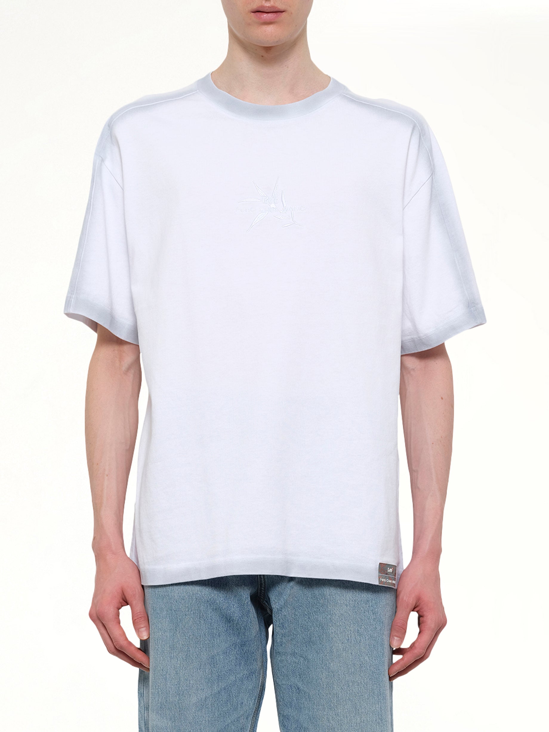 Image of T-Shirts. Product name - FCW x Lee T-Shirt in White colour by brand - FENG CHEN WANG
