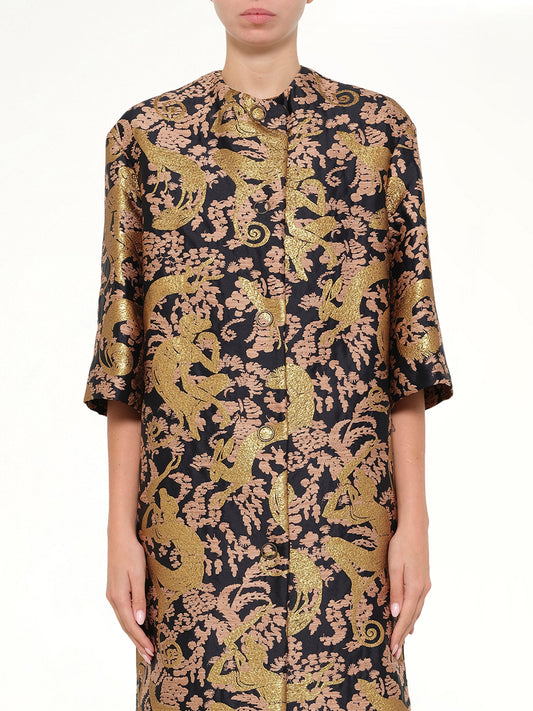 Image of a model wearing Outerwear. Product name - Coat in Gold colour by brand - LANVIN