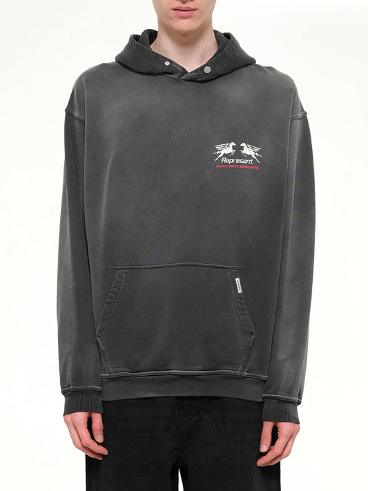 Image of a model wearing Outerwear. Product name - 24 Hour Service Hoodie in Black colour by brand - REPRESENT