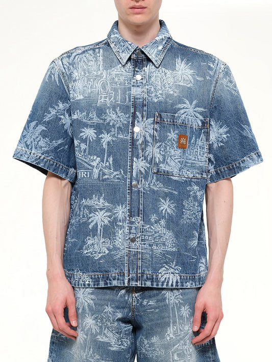 Image of a model wearing Tops. Product name - Chateau Palms Denim Shirt in Indigo colour by brand - AMIRI