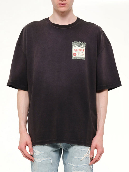 Image of T-Shirts. Product name - Chateau Stamp Oversized T-Shirt in Black colour by brand - AMIRI