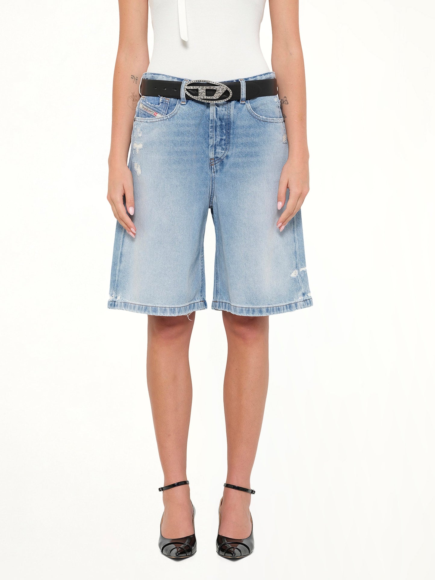 Image of a model wearing Shorts. Product name - DE-SIRE-SHORT in Blue colour by brand - DIESEL