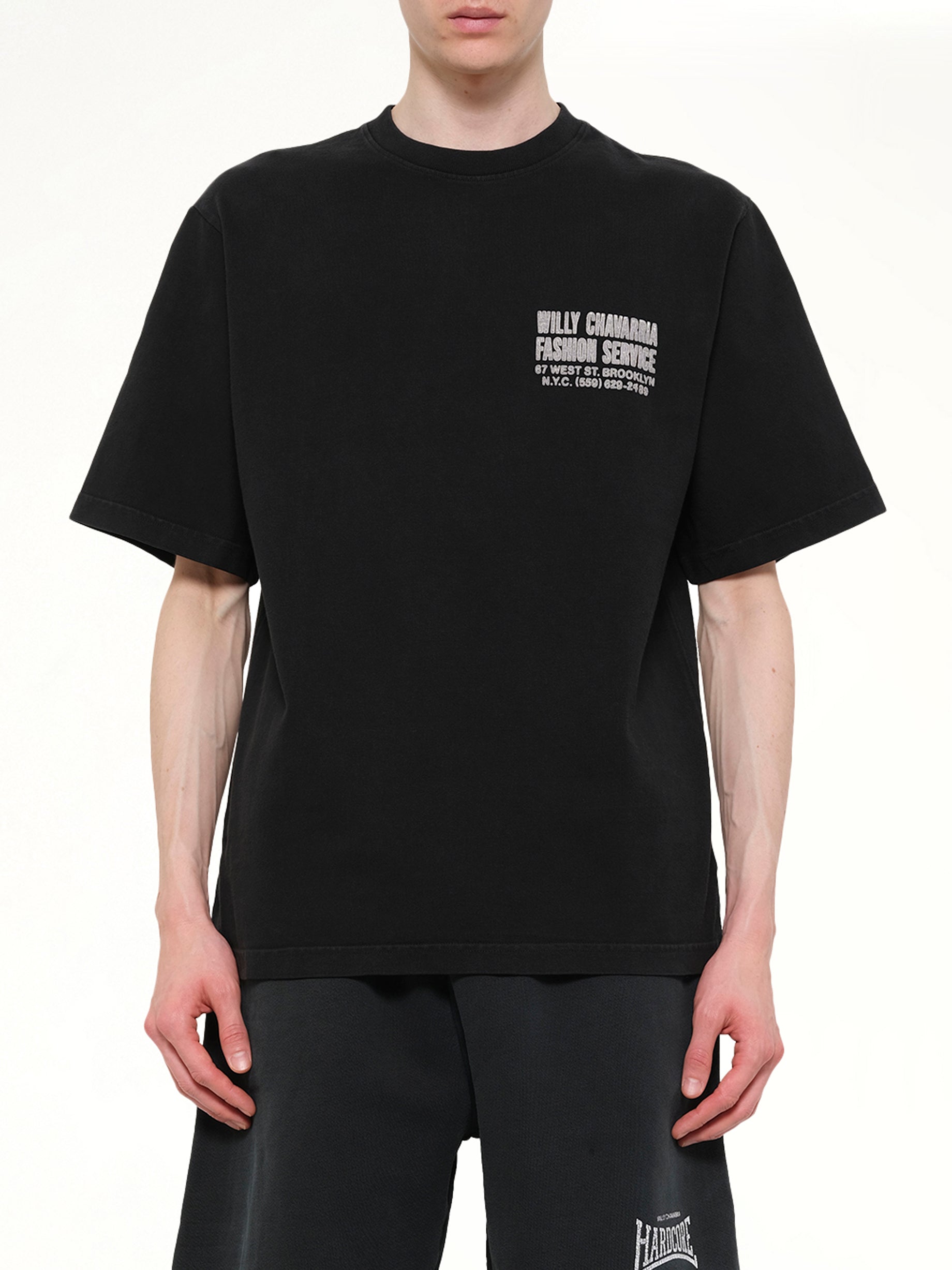 Image of T-Shirts. Product name - "Fashion Services" Standard T-Shirt in Black colour by brand - WILLY CHAVARRIA