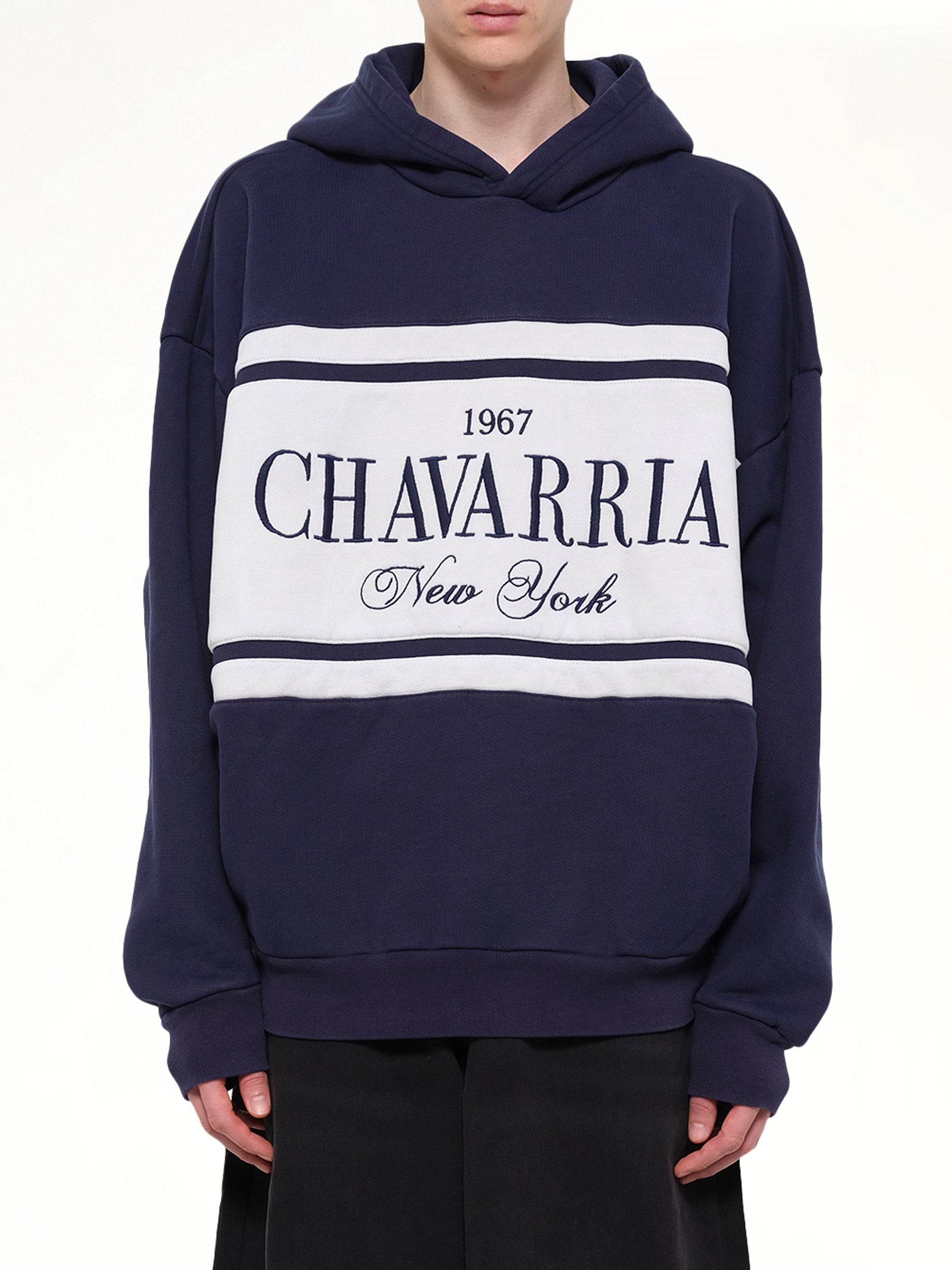 Image of a model wearing Outerwear. Product name - Chavarria Stripe Gilroy Hoodie in Blue colour by brand - WILLY CHAVARRIA