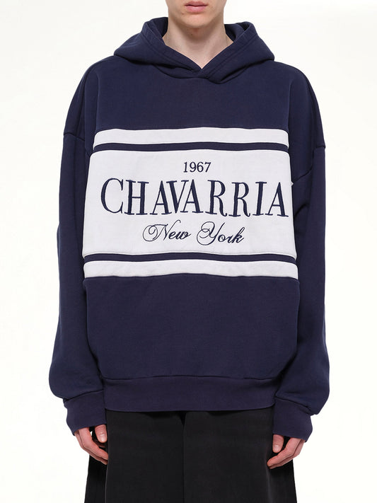 Image of a model wearing Outerwear. Product name - Chavarria Stripe Gilroy Hoodie in Blue colour by brand - WILLY CHAVARRIA