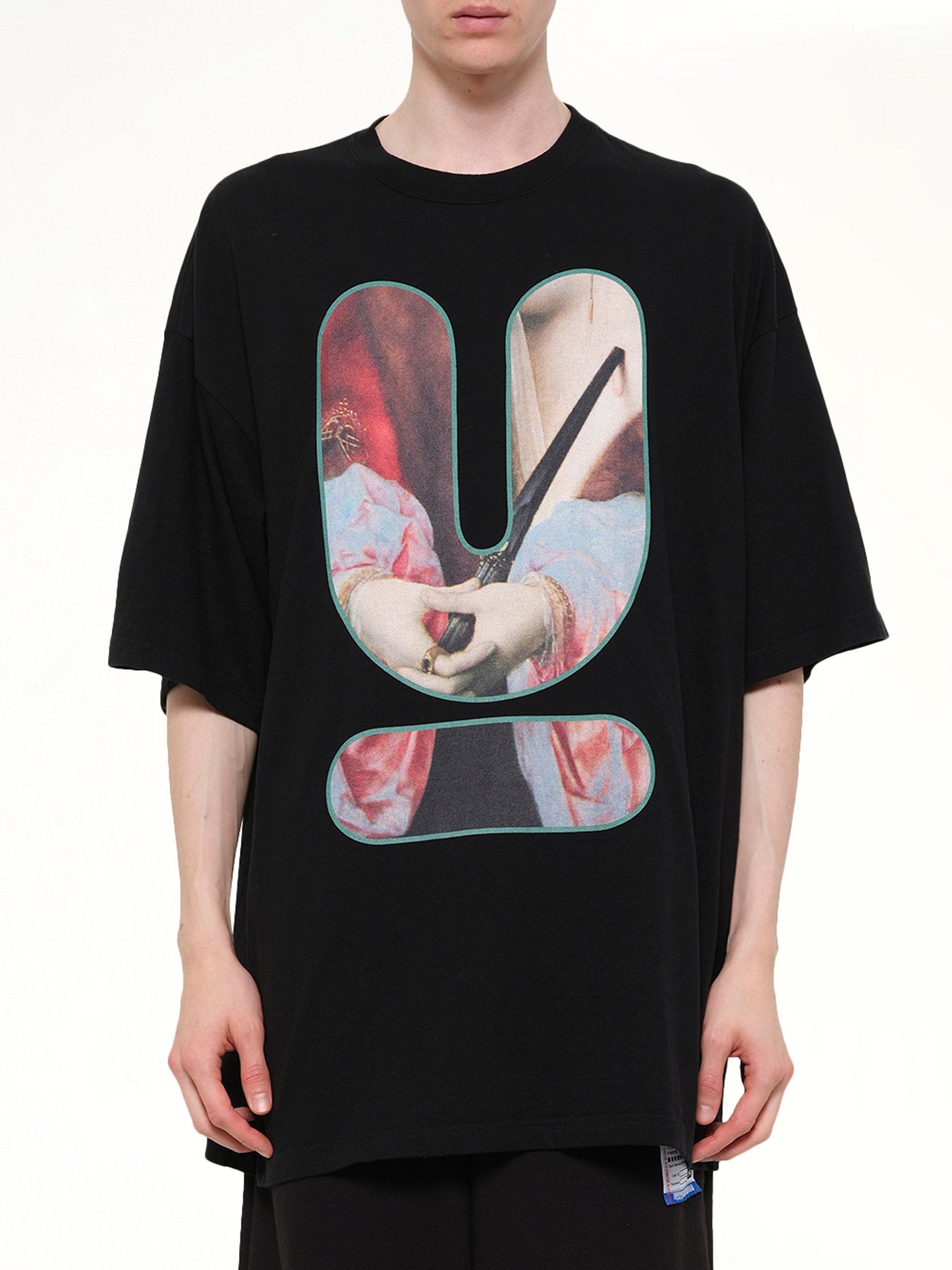 Image of T-Shirts. Product name - Portrait U Logo T-Shirt in Black colour by brand - UNDERCOVER