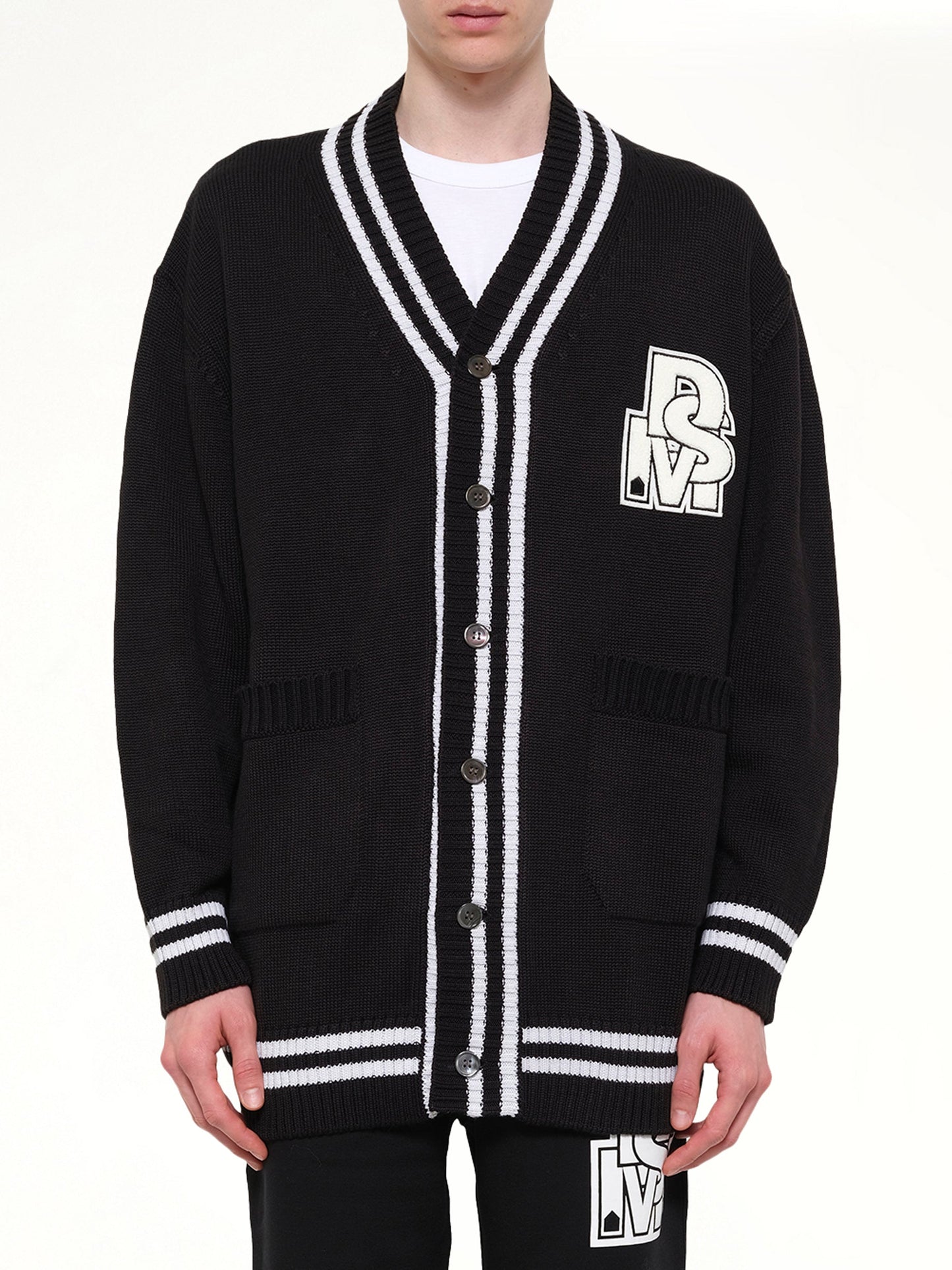 Image of Cardigans. Product name - Oversized Cardigan with Patch in Black colour by brand - DSM KEI NINOMIYA