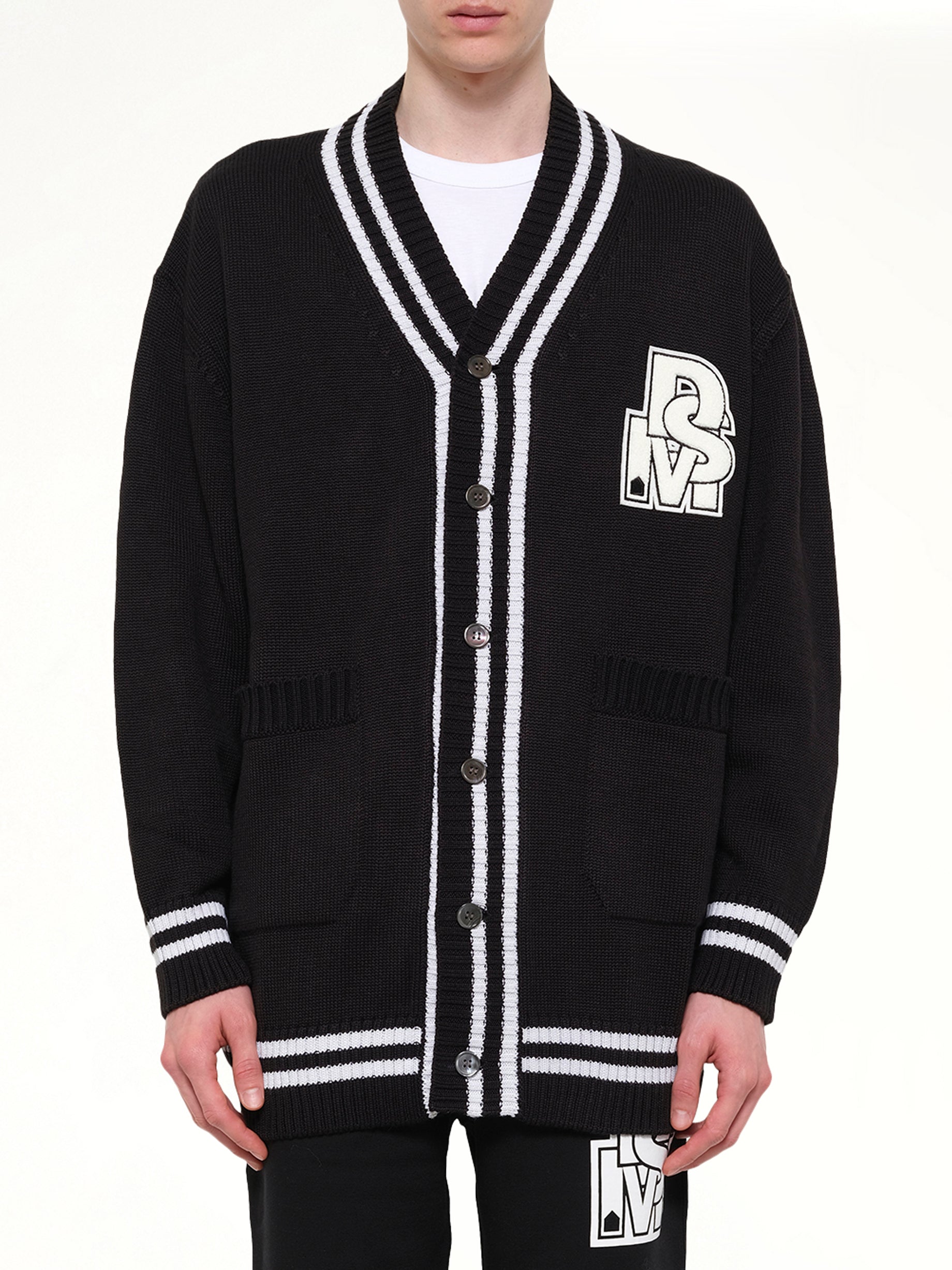 Image of Cardigans. Product name - Oversized Cardigan with Patch in Black colour by brand - DSM KEI NINOMIYA
